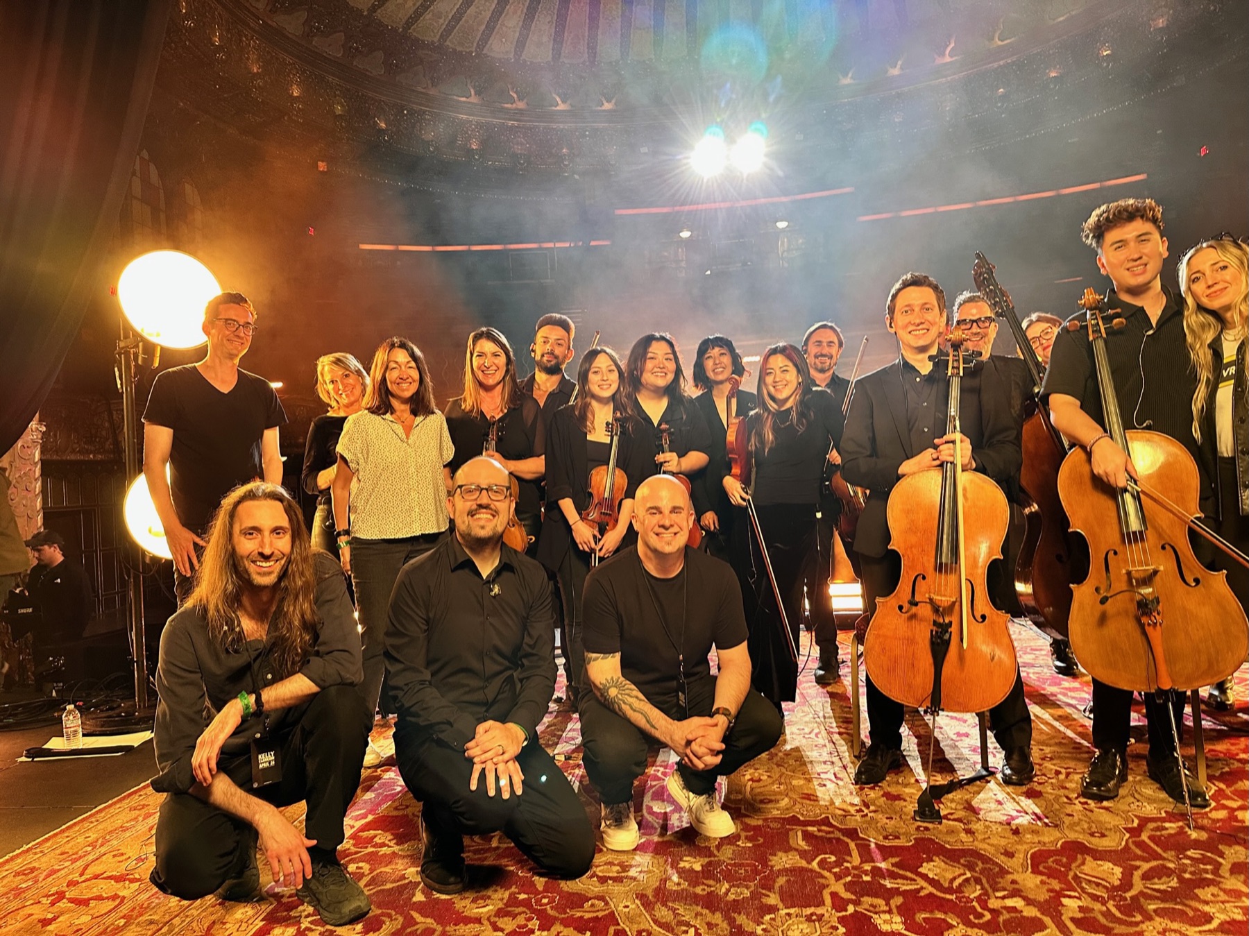 Band and string players on set